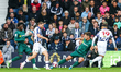 John Swift of WBA, number 10, is in attacking action and is challenged by Ryan Leonard of...