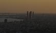 General view of the Mediterranean port of Limassol with skyscrapers at sunset. Cyprus, Sat...