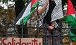 KRAKOW, POLAND - OCTOBER 5:Pro-Palestinian activists gathered in front of the fence of th...