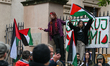 KRAKOW, POLAND - OCTOBER 5:Pro-Palestinian activists gathered in front of the fence of th...