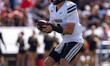 Purdue Boilermakers quarterback Hudson Card #1 takes a snap against the Wisconsin Badgers...