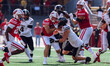 Wisconsin Badgers running back Cade Yacamelli #25 gives a stiff arm against the Purdue Boi...