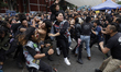 Young people dance during a concert to mark the 44th anniversary of the Tianguis Cultural...