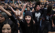 Young people dance during a concert to mark the 44th anniversary of the Tianguis Cultural...