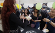 Cake is distributed during a concert on the occasion of the 44th anniversary of the Tiangu...
