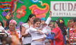 Incoming Mexico City Chief of Government Clara Brugada Molina receives the baton of comman...