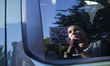A demonstrator appears in a mirror reflection during a pro-Palestinian rally as part of an...
