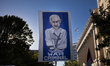 A large picture of Israeli Prime Minister Benjamin Netanyahu displays the text ''War Crimi...