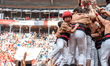Members of Xiquets de Reus celebrate the victory after building a human tower during the C...
