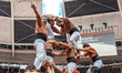 Members of Xiquets de Reus celebrate the victory after building a human tower during the C...
