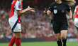 Laia Codina of Arsenal argues with the referee Stacey Pearson during the Barclays FA Women...