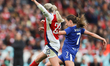 Arsenal's Alessia Russo and Everton's Clare Wheeler participate in the Barclays FA Women's...