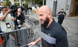 Mohamed Bahi departs court after being arraigned on criminal charges in connection to the...