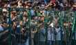Spectators watch a cricket match during the Legends League Cricket match between Toyam Hyd...