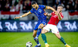 Netherlands forward Cody Gakpo and Hungary defender Endre Botka play during the match betw...