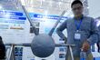 An exhibitor introduces anti-corrosion materials at the 9th China Advanced Materials Indus...