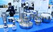 An exhibitor displays titanium alloy materials and products at the 9th China Advanced Mate...