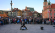 A street performer busker is seen juggling knives in the Old Town in Warsaw, Poland on 12...