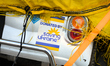 A sticker reading "donated by saving Ukraine" is seen on an electric scooter in Warsaw, Po...