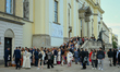 Pepole are seen during a wedding in front of a church in Warsaw, Poland on 12 October, 202...