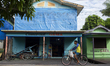 A man rides a bicycle in the streets of the city known as the city of bicycles in Afua, Pa...
