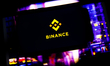 Binance logo is screened on a mobile phone for illustration photo. Krakow, Poland on Octob...