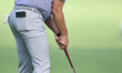 Sam Bairstow of England plays a shot on the 14th green on day one of the Estrella Damm N.A...