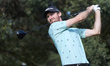 Andrew Wilson of England tees off on the 15th hole on day one of the Estrella Damm N.A. An...