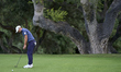 Lukas Nemecz of Austria plays a shot on the 14th green on day one of the Estrella Damm N.A...