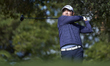 Sung Kang of South Korea tees off on the 15th hole on day one of the Estrella Damm N.A. An...