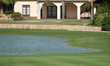 Paul Waring of England plays his second shot on the 14th hole on day one of the Estrella D...