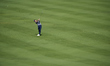 Marco Penge of England plays his second shot on the 14th hole on day one of the Estrella D...