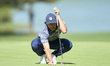 Marco Penge of England studies his shot on the 14th green on day one of the Estrella Damm...