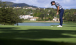 Marco Penge of England plays his shot on the 14th green on day one of the Estrella Damm N....