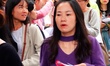 Candidates queue to enter the exam room during the 2024 National Adult College Entrance Ex...