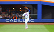 New York Mets right fielder Starling Marte #6 makes a catch during the third inning in Gam...