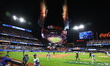 The New York Mets celebrate with fireworks after the team's 12-6 victory in Game 5 of the...