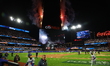 The New York Mets celebrate with fireworks after the team's 12-6 victory in Game 5 of the...