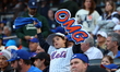 The New York Mets hold up an OMG sign during the first inning in Game 5 of the baseball NL...