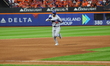 Los Angeles Dodgers player Andy Pages #44 rounds the bases after homering during the fifth...