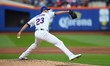 New York Mets starting pitcher David Peterson #23 throws during the first inning in Game 5...