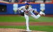 New York Mets starting pitcher David Peterson #23 throws during the first inning in Game 5...