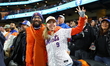 New York Mets fans sing ''Take Me Out to the Ball Game'' during the seventh inning stretch...