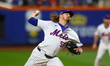 New York Mets relief pitcher Ryne Stanek #55 throws during the sixth inning in Game 5 of t...