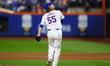 New York Mets relief pitcher Ryne Stanek #55 throws during the seventh inning in Game 5 of...