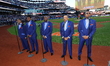 The Temptations sing the National Anthem on the field before Game 5 of a baseball NL Champ...