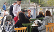 A waiter serves at a cafe in Athens, Greece, on October 19, 2024. 