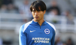 Kaoru Mitoma of Brighton and Hove Albion warms up during the Premier League match between...