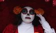 A woman dresses as a catrina during the Zombie March in Mexico City, Mexico, on October 19...