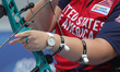 Alexis Ruiz of the United States competes against Sara Lopez of Colombia (not in picture)...
